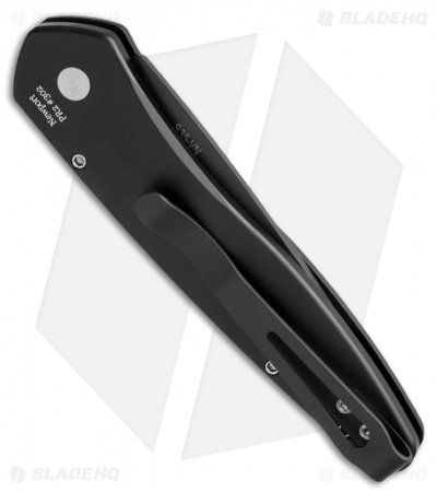 protech-newport-black-handle-camo-g10-black-blade-side.jpg